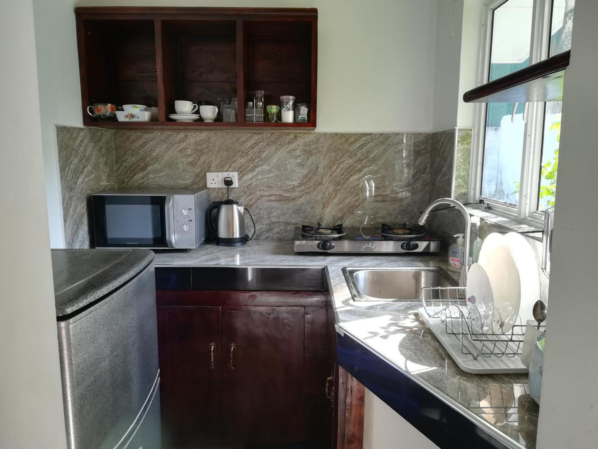 Living Home Negombo Phòng bức ảnh